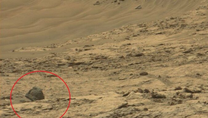 Uz Marsa saskatīts kases aparāts