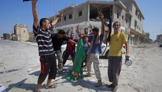NVO: Lībijā ieslodzīti un spīdzināti ap 300 ārzemnieku aizdomās par Kadafi atbalstīšanu
