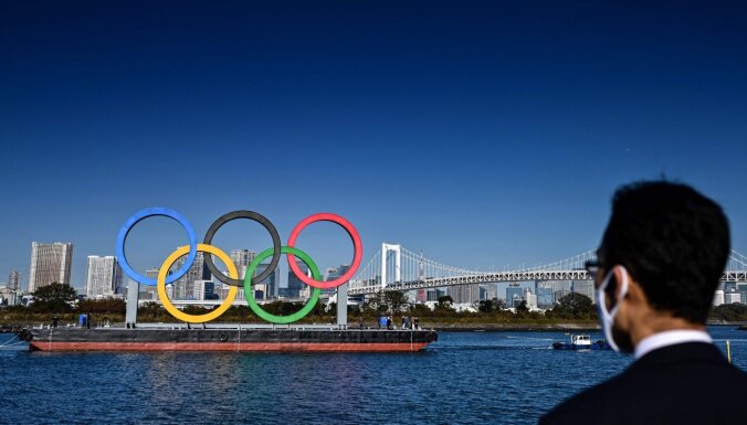 Tokijas olimpisko spēļu organizatori noliedz, ka olimpiskās lāpas stafete Osakas pilsētā nenotiks
