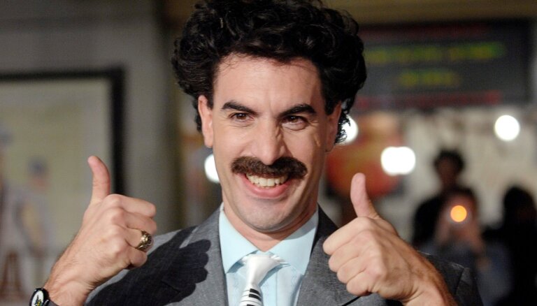 Koens sūdz tiesā marihuānas veikalu par Borata tēlu tā reklāmā