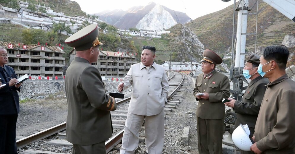 Photo: Kim Chenun assesses flood damage and progress in preventing it